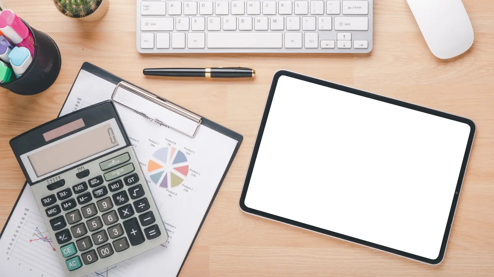 Analytics workspace with tablet showing business data for AI consulting cost estimation