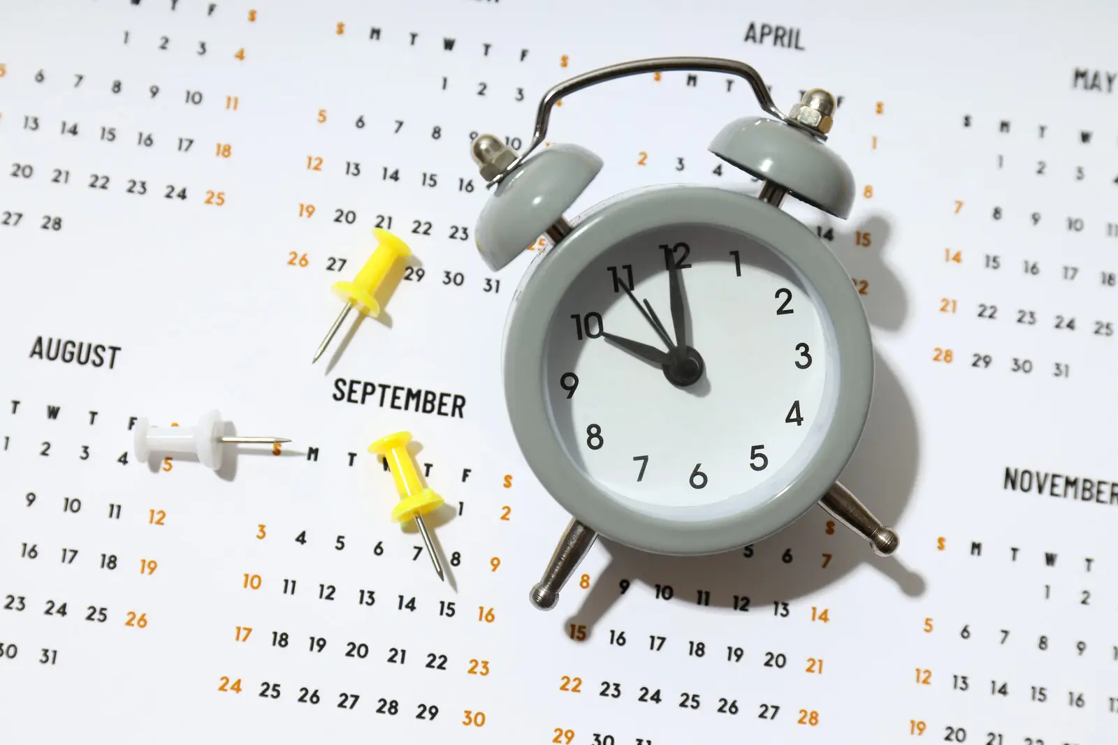Calendar and planning materials representing realistic AI project timelines for small businesses