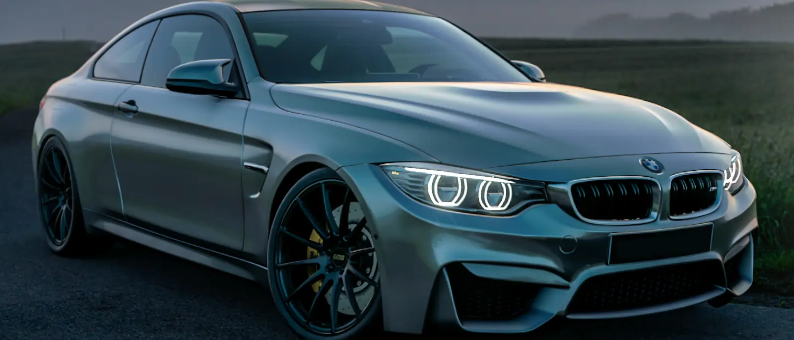 Car dealership showroom floor with digital displays and modern customer experience technology