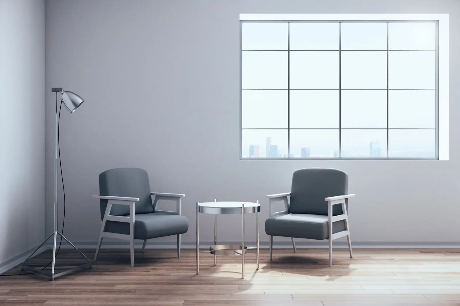 Quiet counseling office with two chairs by a window, the private practice setting behind therapist website design