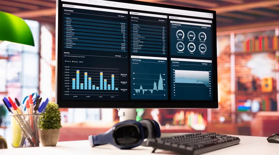 Business reporting dashboard showing cash flow, profit margin and revenue figures pulled together on a single custom screen