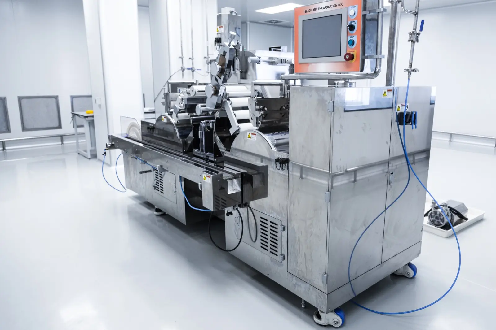 Automated production machine with a control computer in a clean manufacturing facility