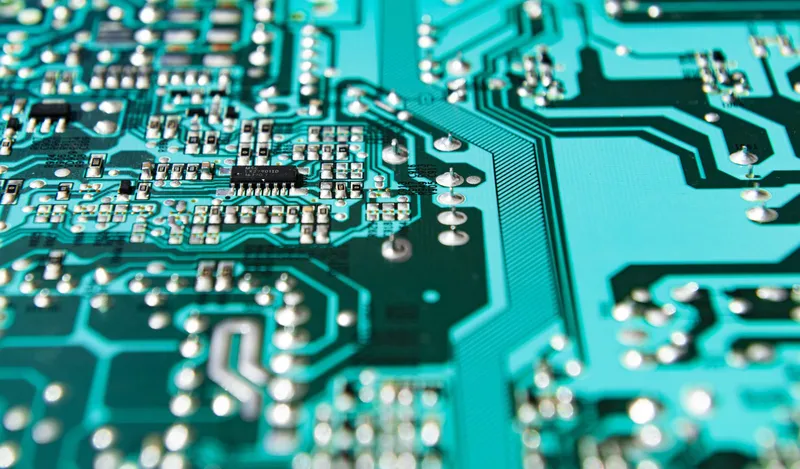 Close-up of illuminated circuit board representing AI integration and automation technology for Tampa Bay businesses