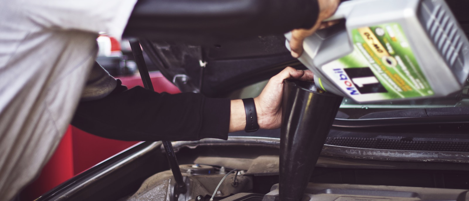 Automotive repair shop with modern diagnostic equipment and digital service management technology