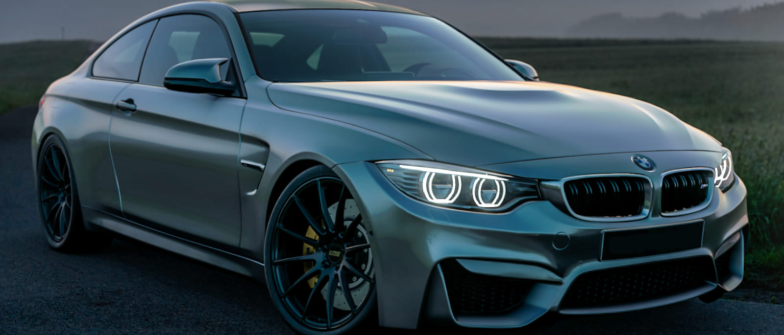 Car dealership showroom floor with digital displays and modern customer experience technology