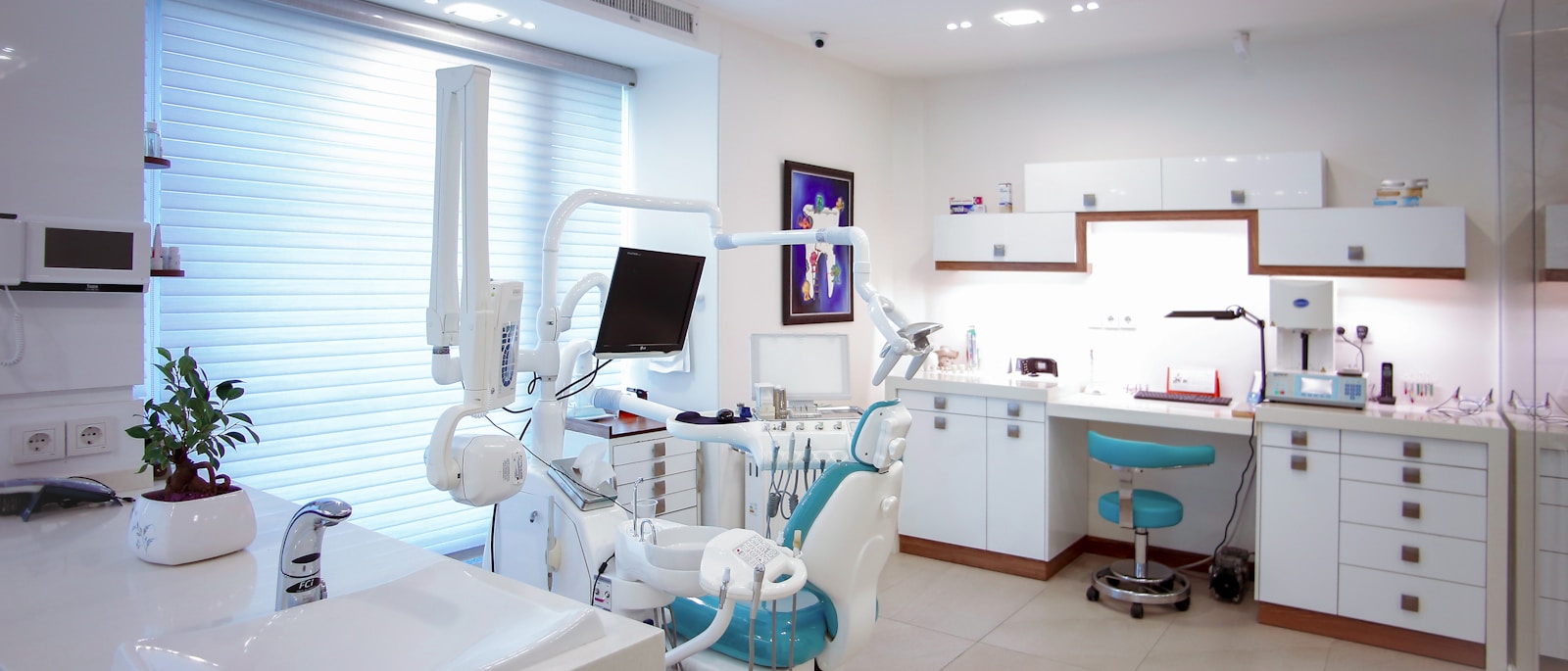 Dental office reception area with modern technology and digital patient check-in systems