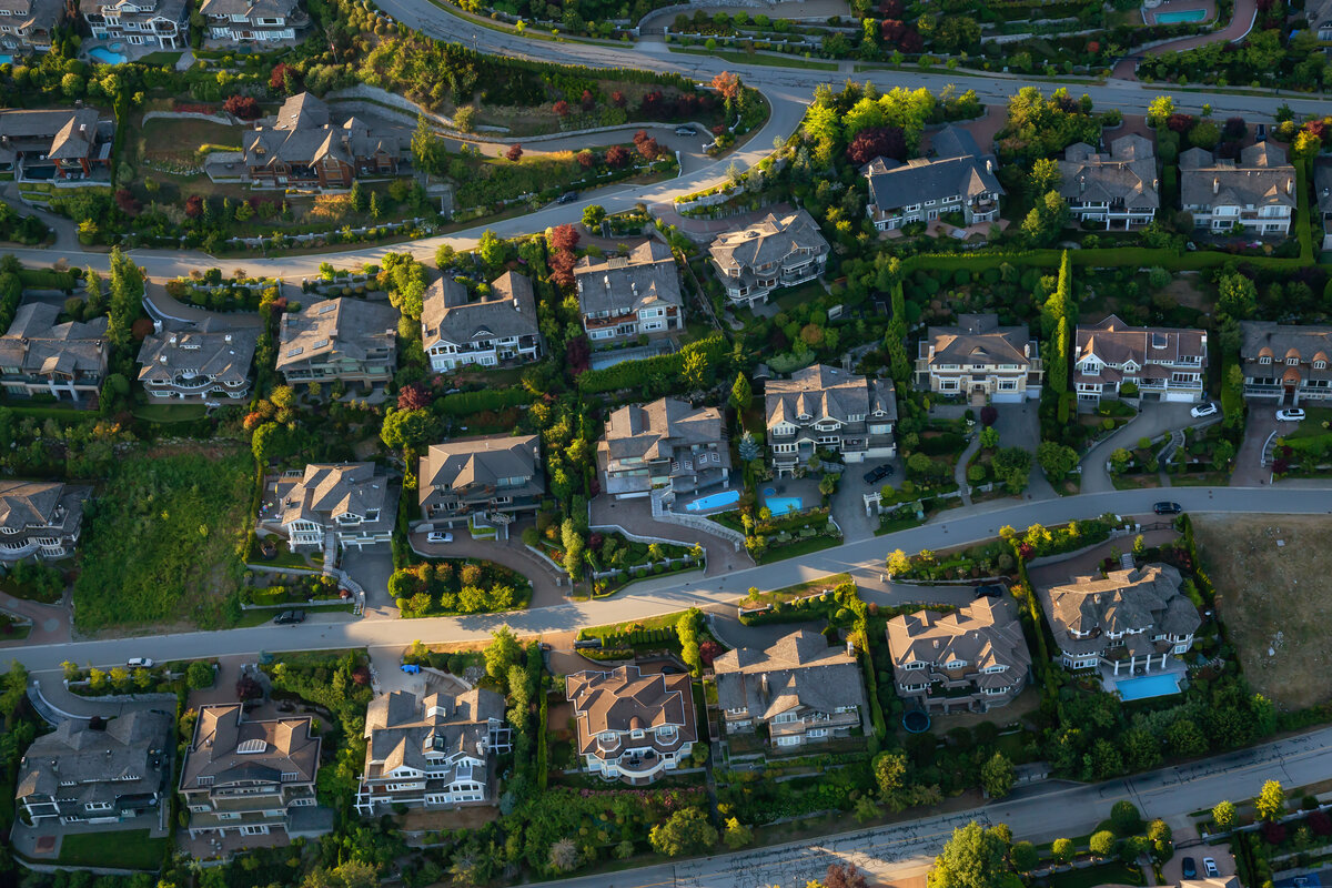Aerial view of luxury residential neighborhood representing real estate technology and property management