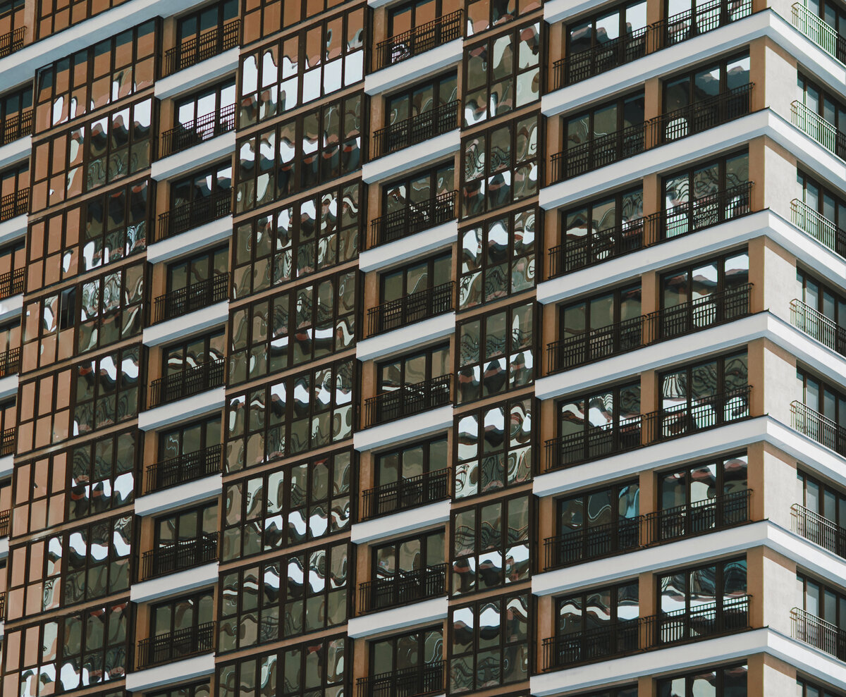 Modern apartment building architecture representing urban real estate technology solutions