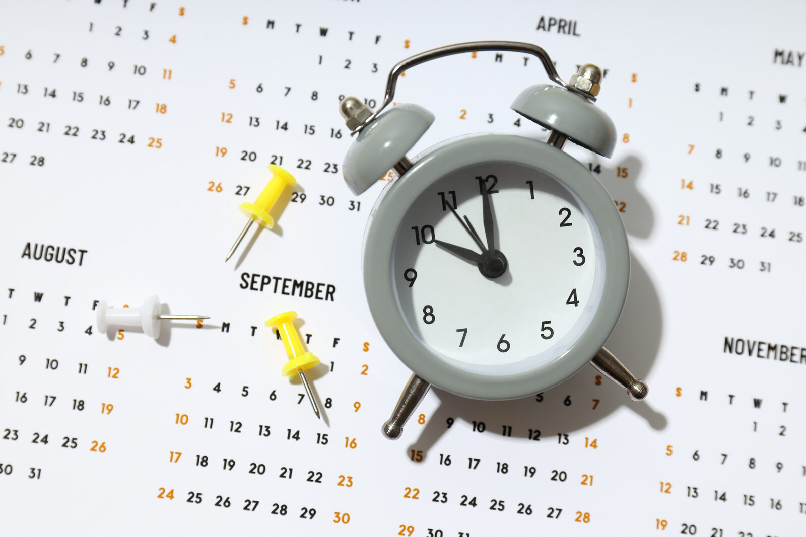 Calendar and planning materials representing realistic AI project timelines for small businesses