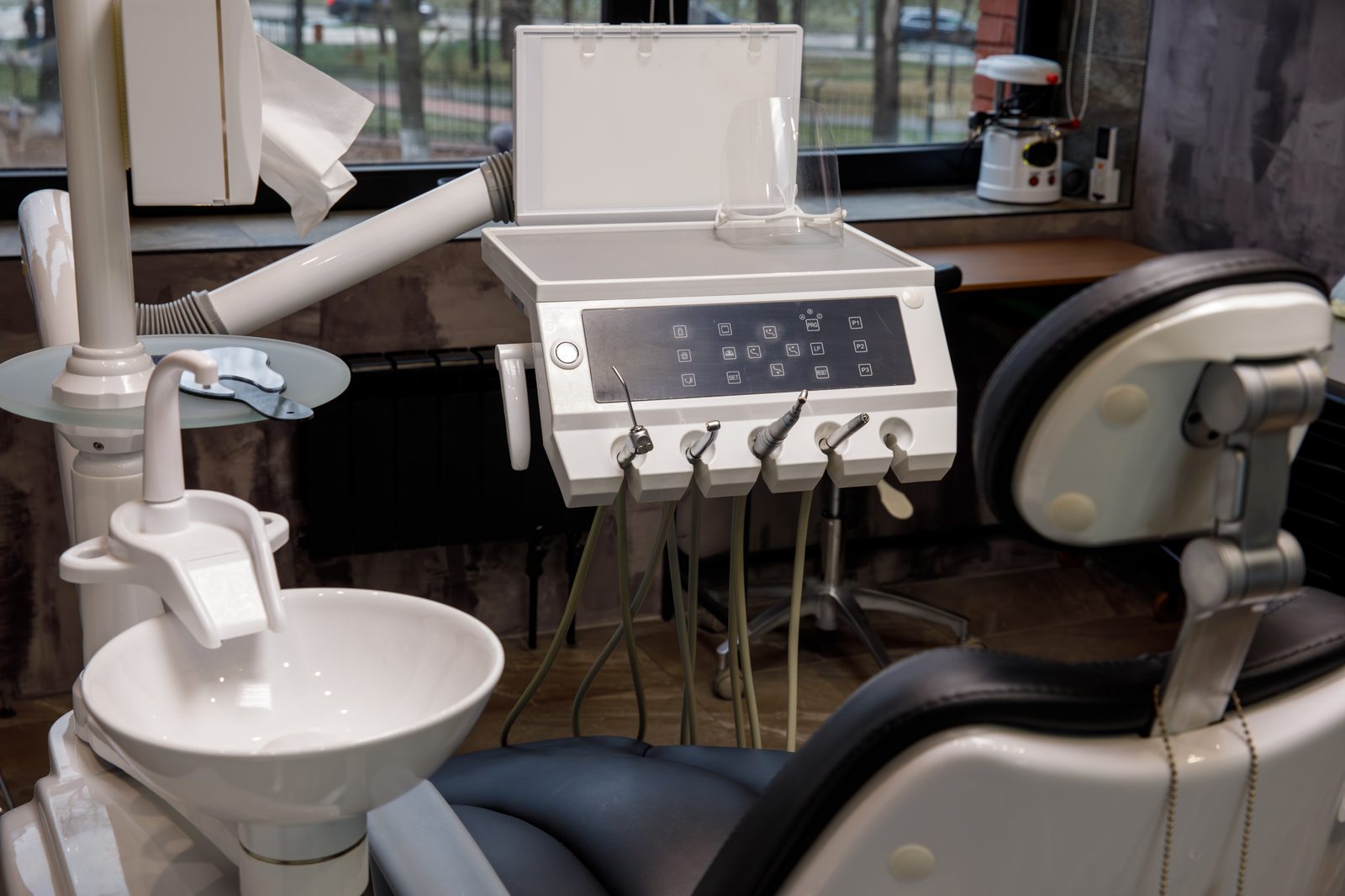 Modern dental clinic equipment and treatment chair representing AI-powered healthcare automation and patient management